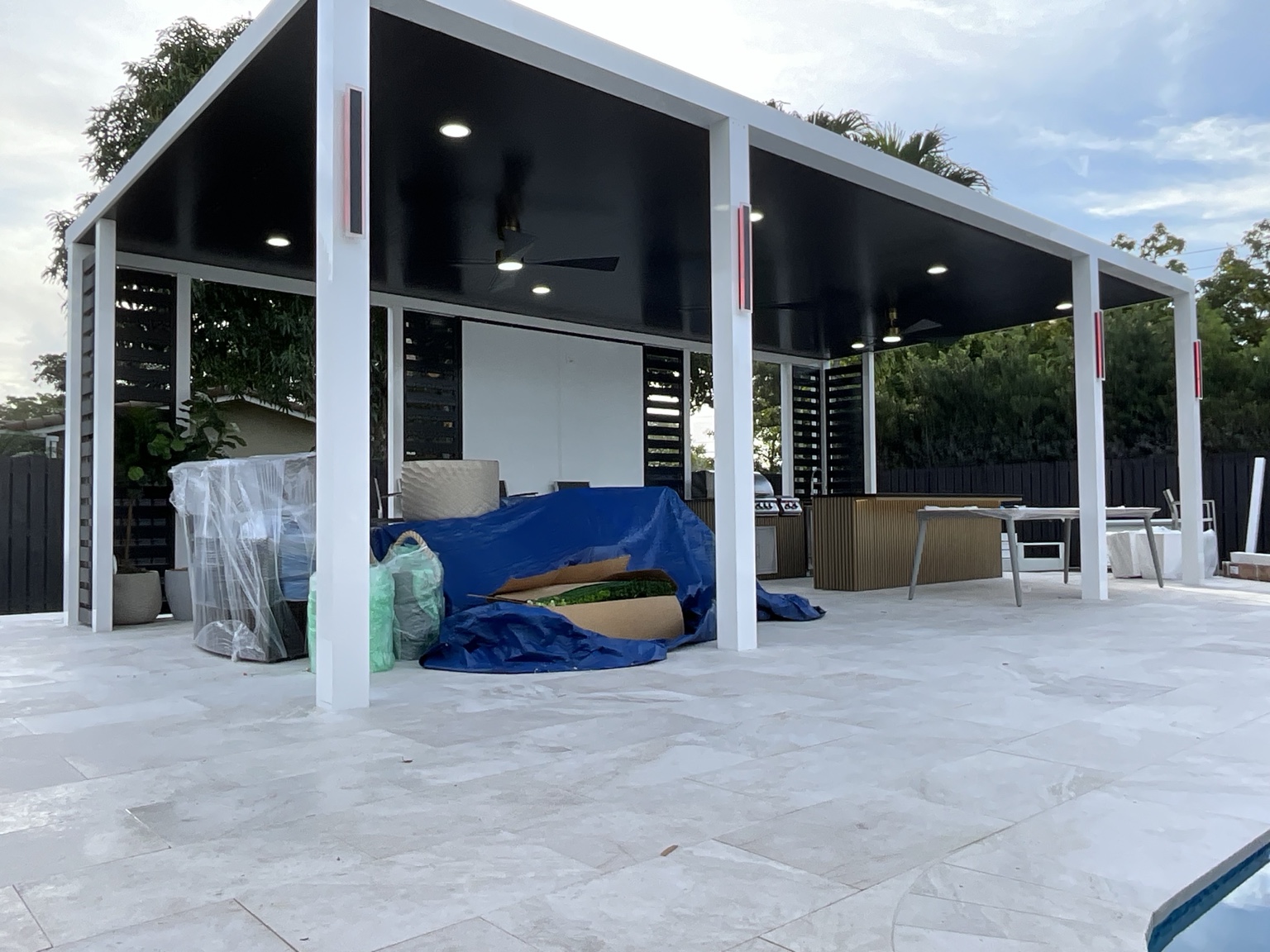 Wide angle of the completed custom pergola installation